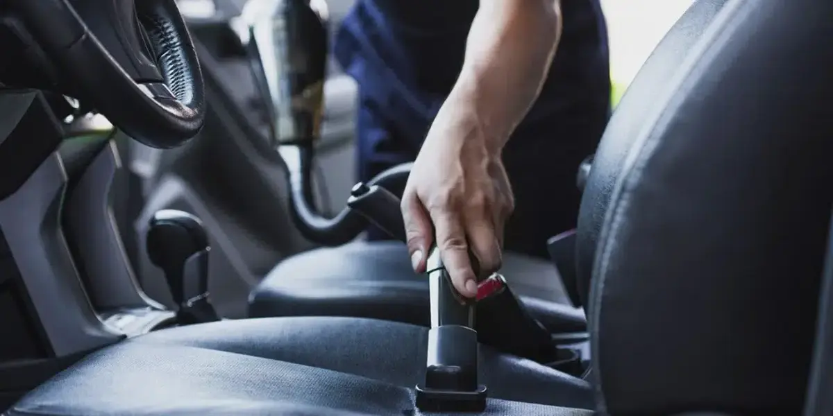 Interior vacuum cleaning during DIY car detailing