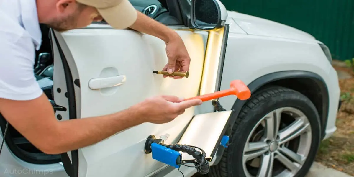 Detailed check of door alignment and body panel gaps on a used Toyota Corolla to spot accident damage