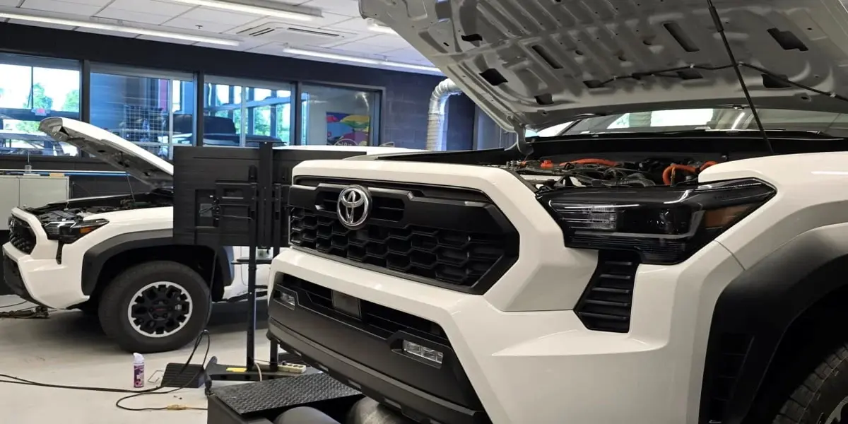 Engine bay of a Toyota Tacoma featuring the i-FORCE MAX hybrid turbo powertrain.