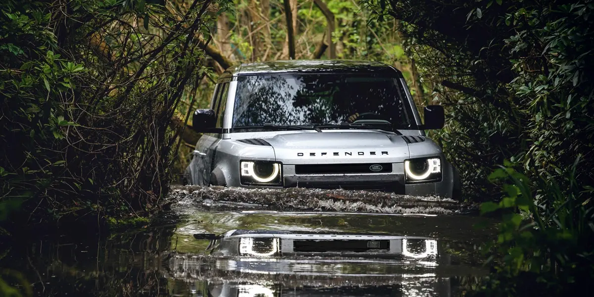 Defender crossing water