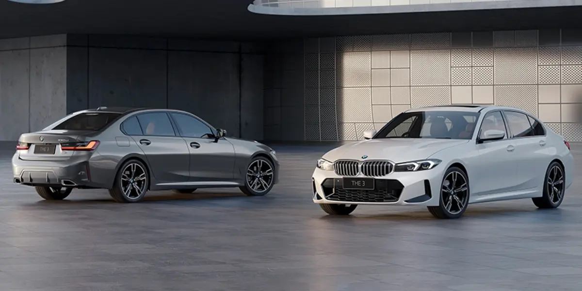 Side-by-side comparison view of two BMW 3 Series sedans.