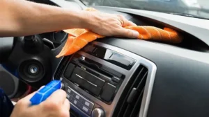car germ hotspot cleaning on a car steering wheel and dashboard