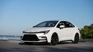 Toyota Corolla Hybrid dashboard showing real-time fuel economy readout