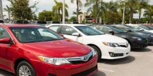 Toyota Corolla Near Me: Toyota Corolla sedan parked outside an authorized Toyota dealership