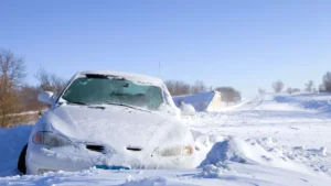 Ice Car: A frost-covered car parked outside on a freezing winter morning demonstrating cold weather car problems.